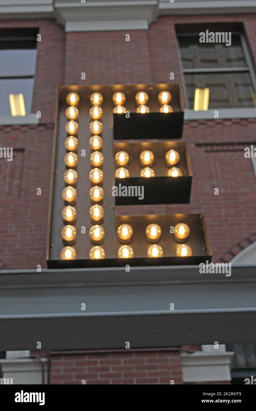A vertical of a big letter E with electric lamps in Vancouver, British Columbia, Canada. Stock Photo