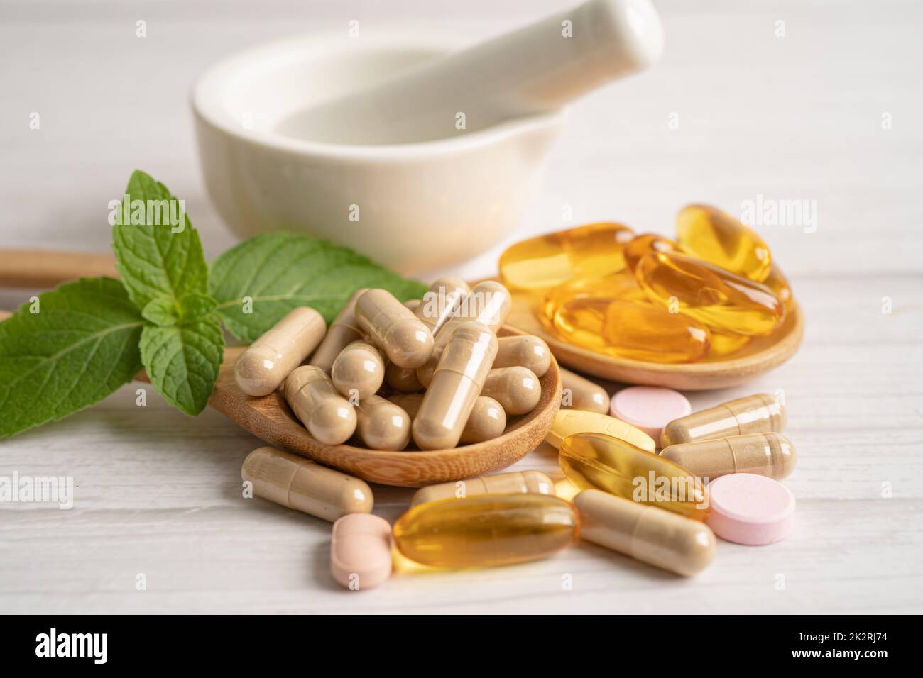 Alternative medicine herbal organic capsule with vitamin E omega 3 fish