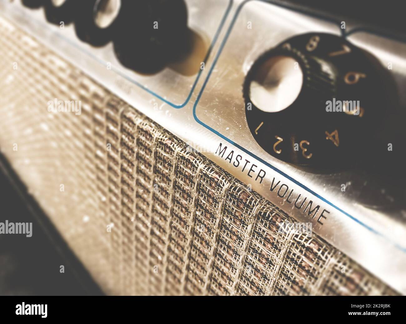 Close-up view of the knobs of an amplifier for adjusting the sound of stringed musical instruments Stock Photo