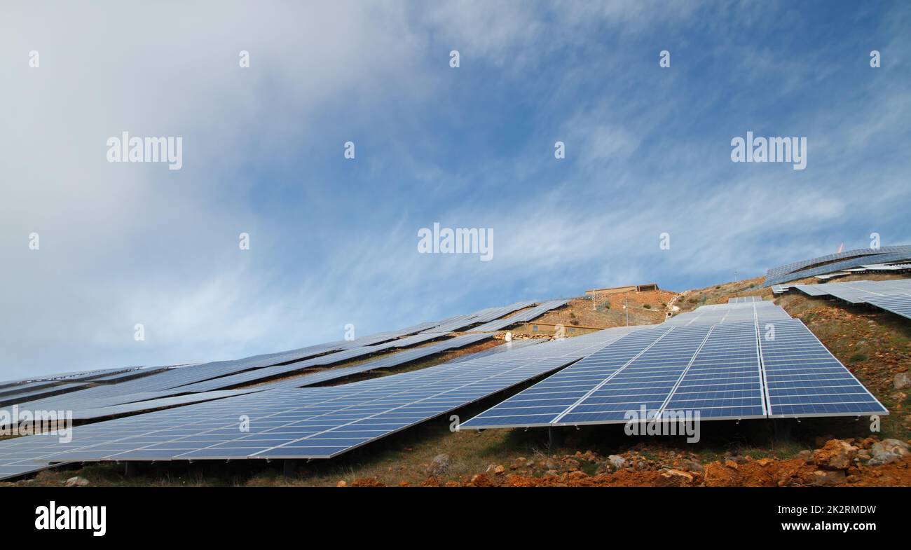 Solar Panels Against The Deep Blue Sky Stock Photo