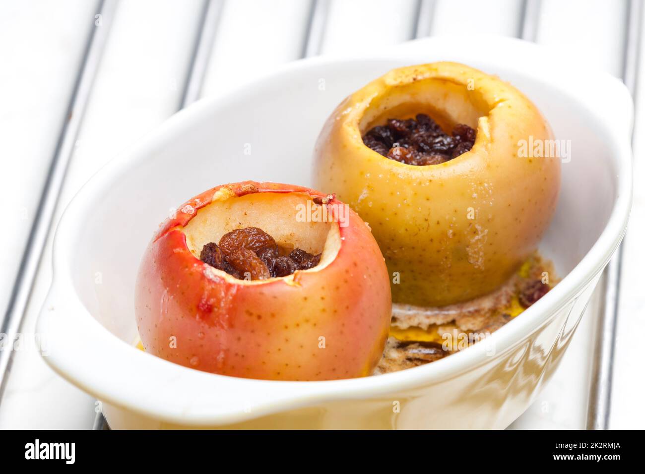sweet apples baked with raisins Stock Photo - Alamy