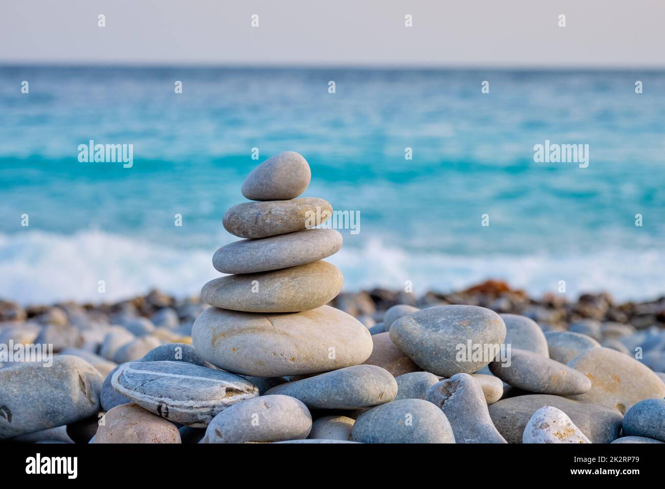Zen balanced stones stack on beach Stock Photo