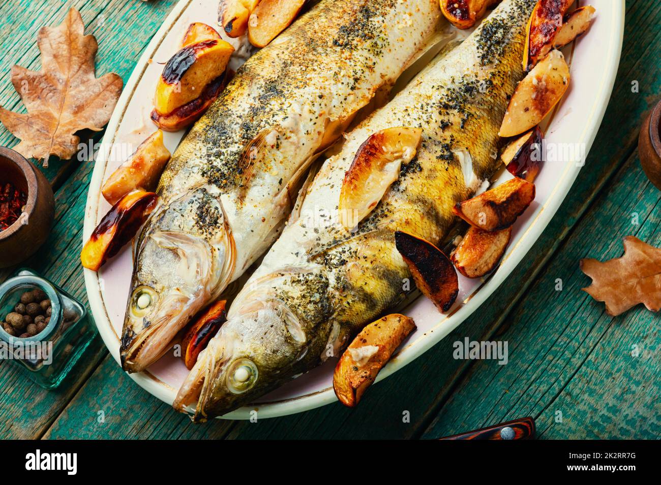 Grilled dietary fish with quince Stock Photo