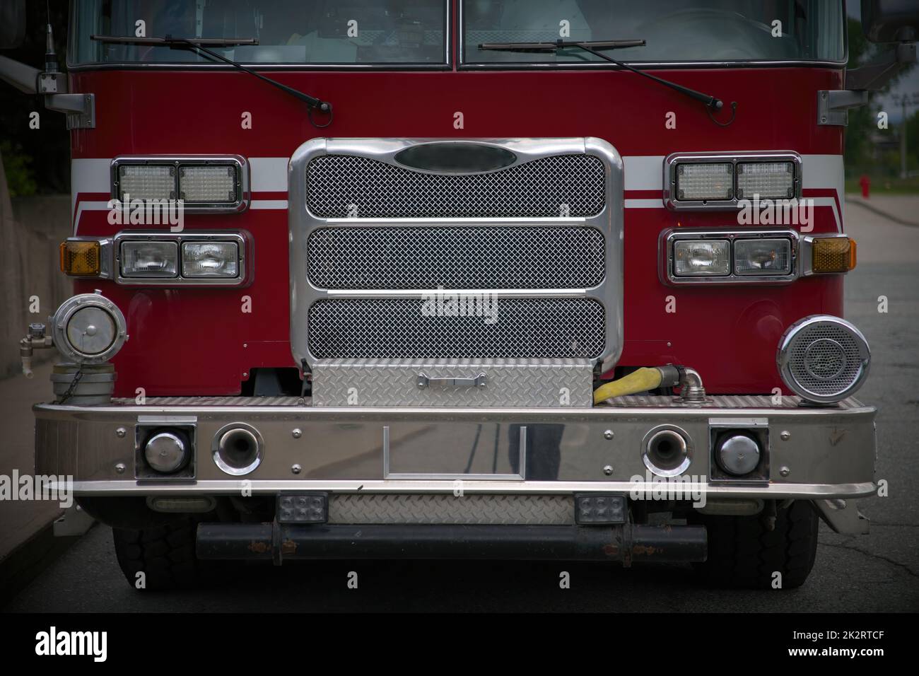 fire truck rescue firefighter red emergency vehicle front view Stock Photo
