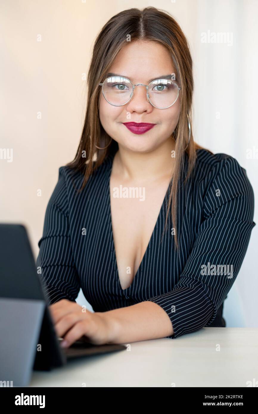 Female leadership. Successful career. Empowerment independence. Portrait of confident ambitious smart business woman in glasses working with laptop on Stock Photo