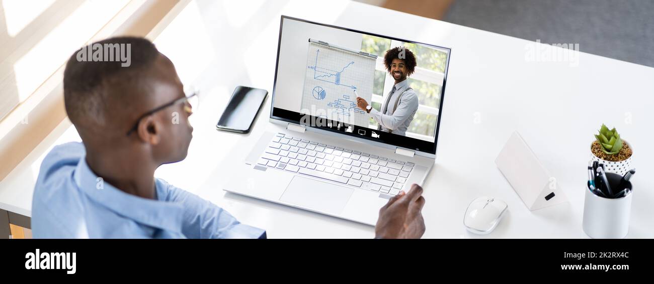Man Participating In Online Coaching Session Stock Photo