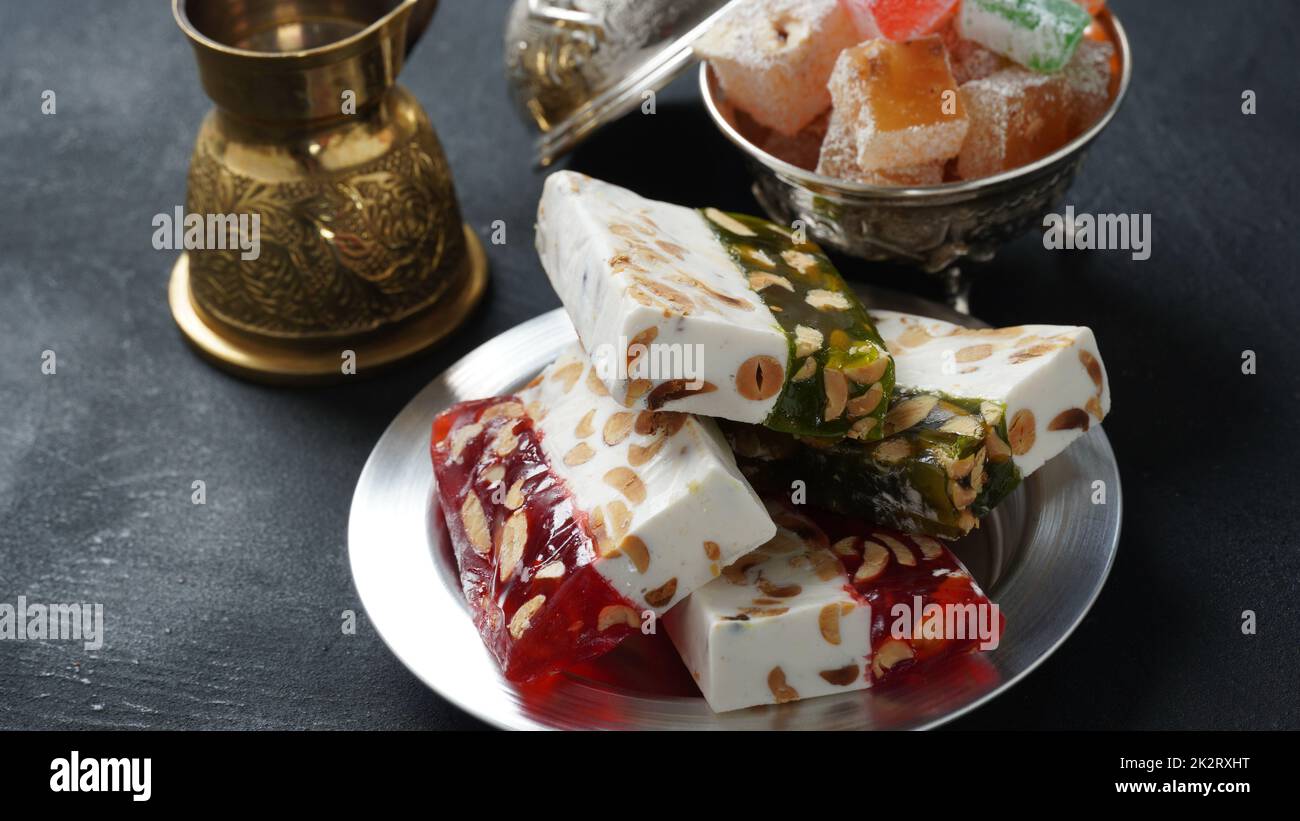 Assorted Turkish delights Rahat lokum. Colorful cubes of Turkish delights. Ramadan bayrami (eid al fitr) and Kurban bayrami (eid al adha) background photo. Stock Photo
