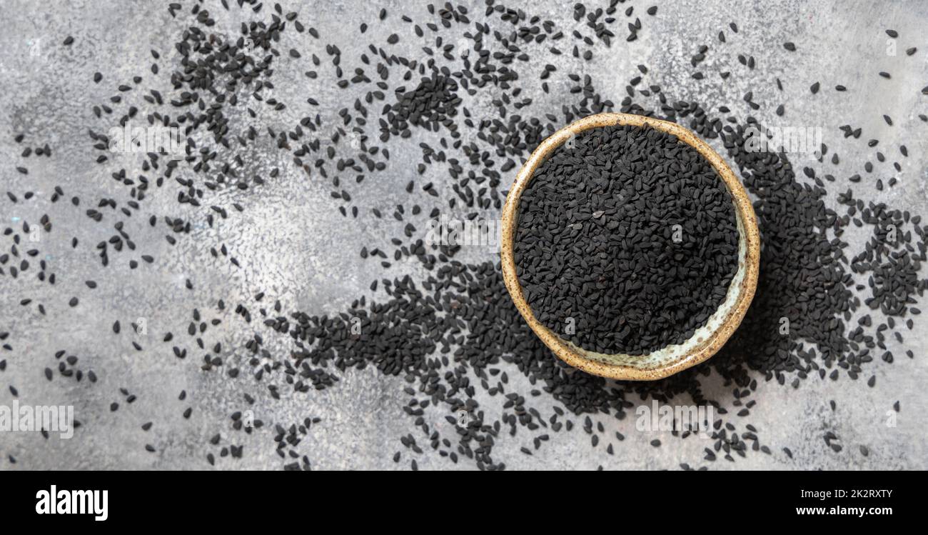 Indian spice Black cumin (nigella sativa or kalonji) seeds in bowl top view Stock Photo