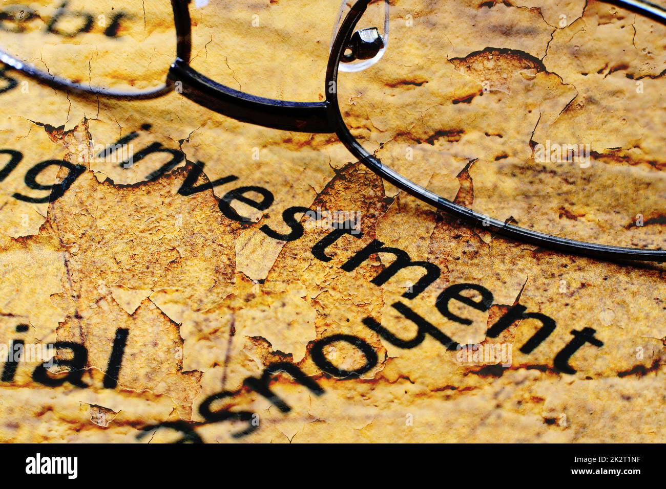 Investment text on grunge background Stock Photo