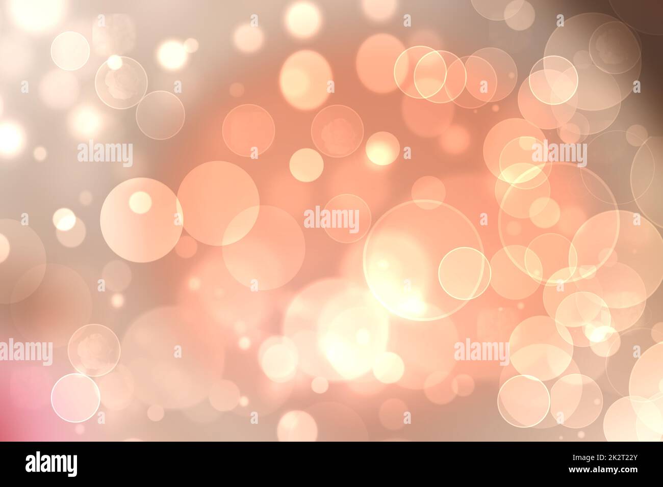 Abstract festive light brown gradient pink orange bokeh background texture with colorful circles and bokeh lights. Beautiful backdrop with space. Stock Photo