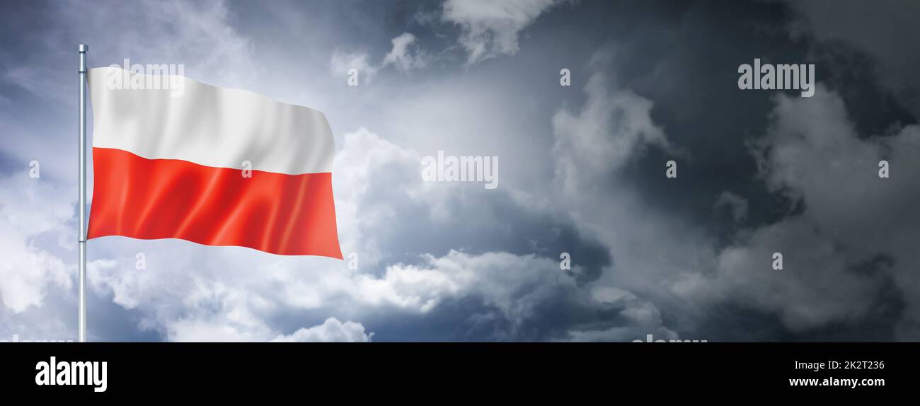 Polish flag on a cloudy sky Stock Photo