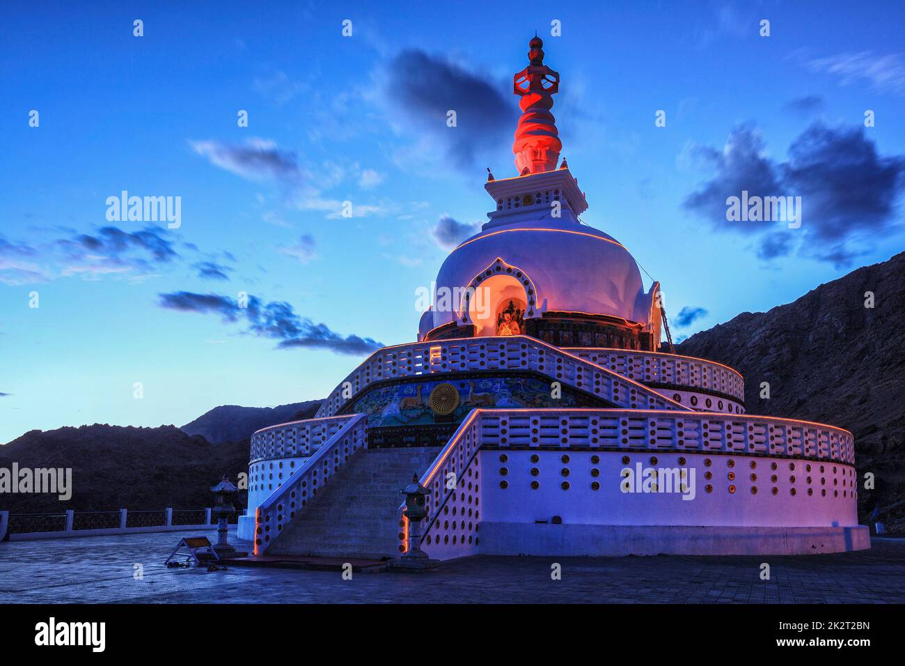 Shanti stupa illuminated in the evening twilight. Leh, Ladakh Stock Photo
