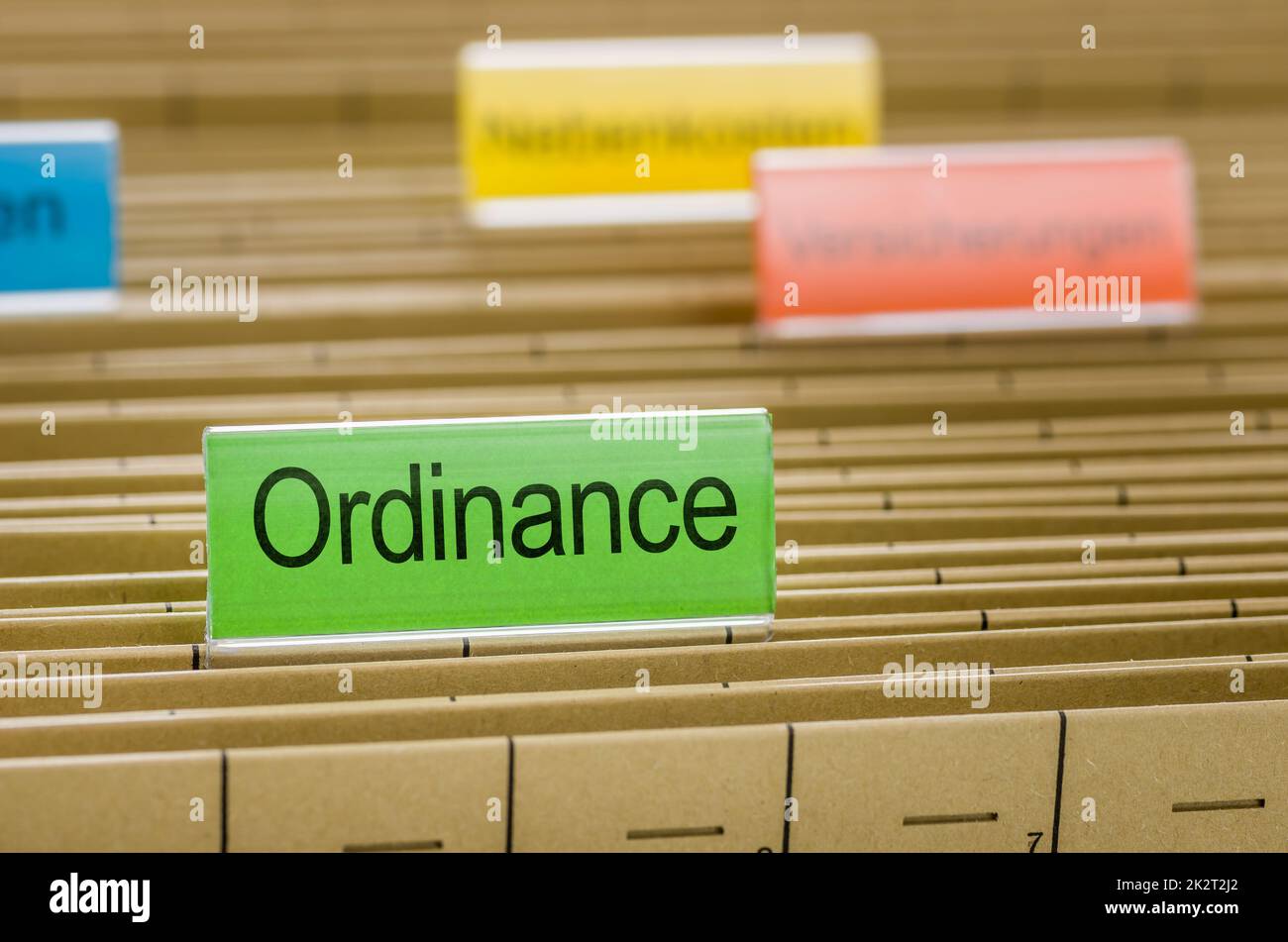 Hanging file folder labeled with Ordinance Stock Photo