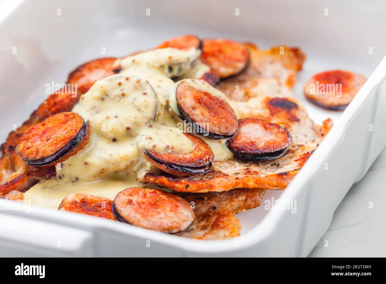 pork fillet with sausage and mustard sauce Stock Photo Alamy