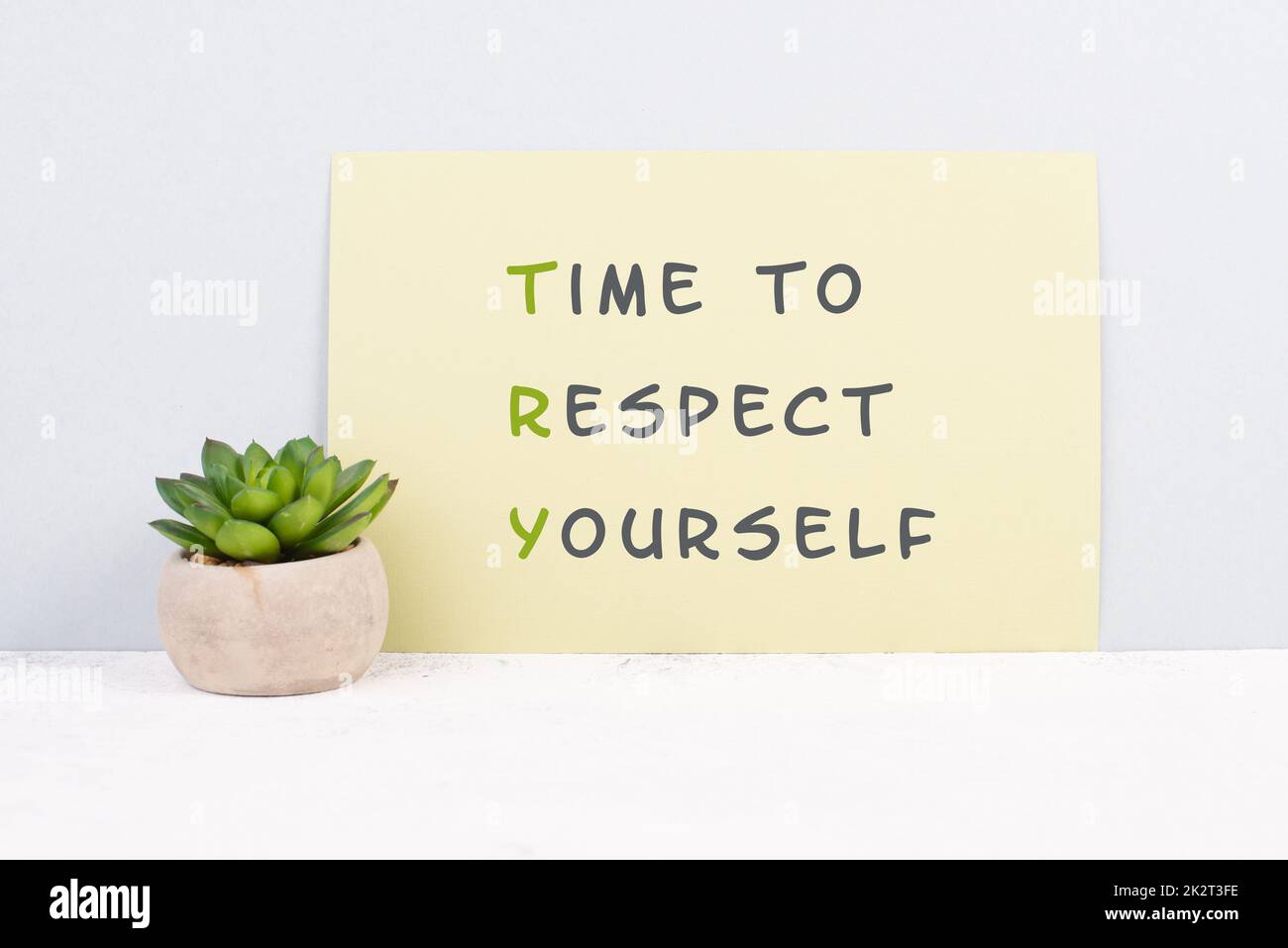 The words time to respect yourself are standing on paper, responsibility and development, motivation concept, cactus plant beside the message Stock Photo