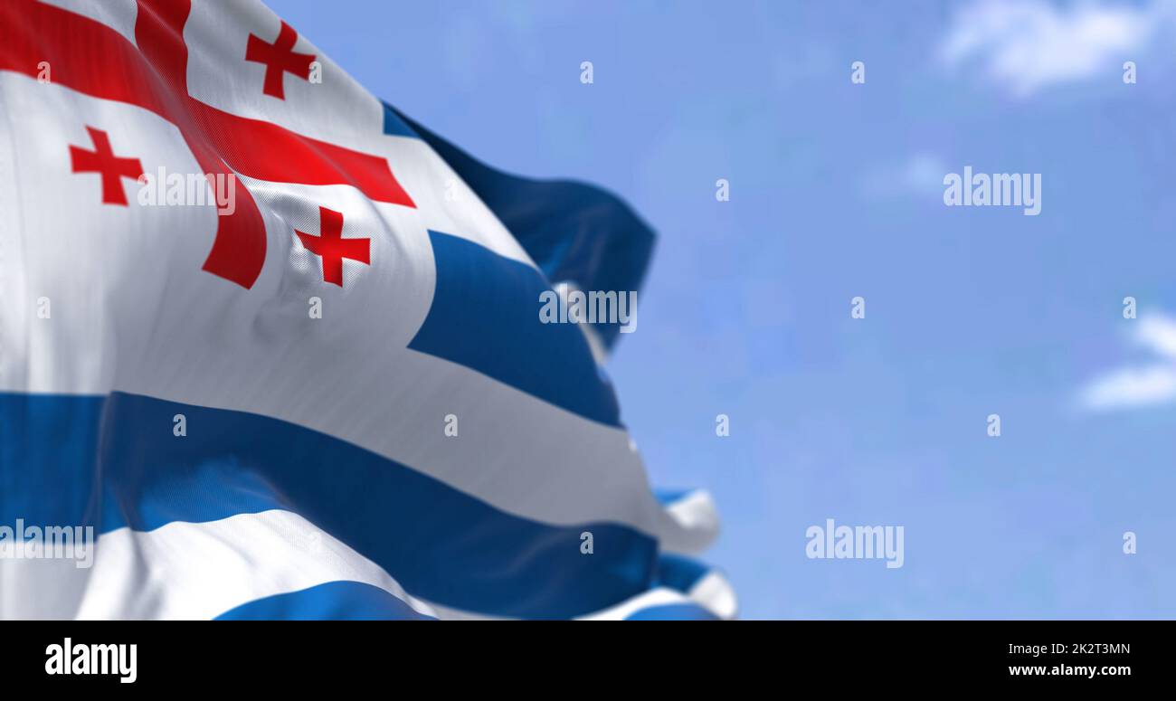 The flag of Adjara waving in the wind on a clear day. Adjara s a political-administrative region of Georgia Stock Photo