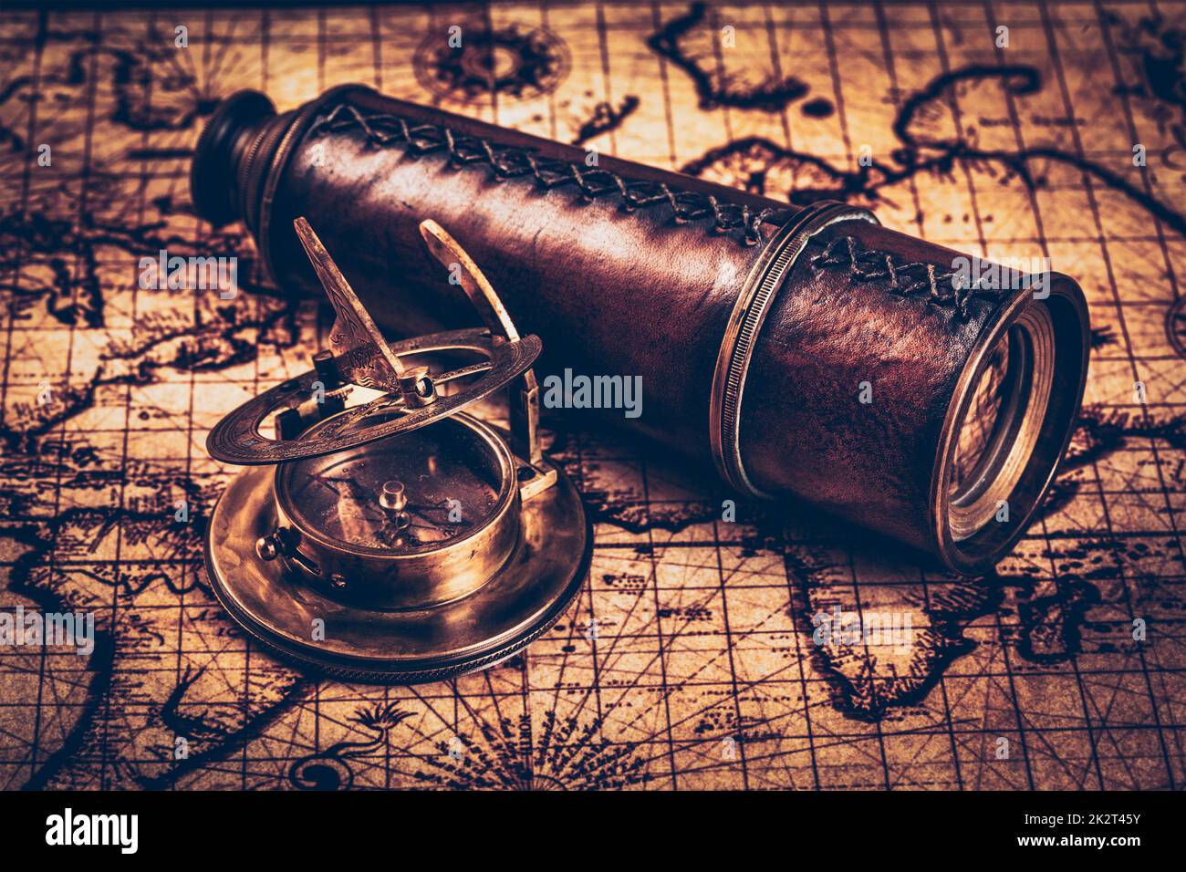 Old vintage compass on ancient map Stock Photo