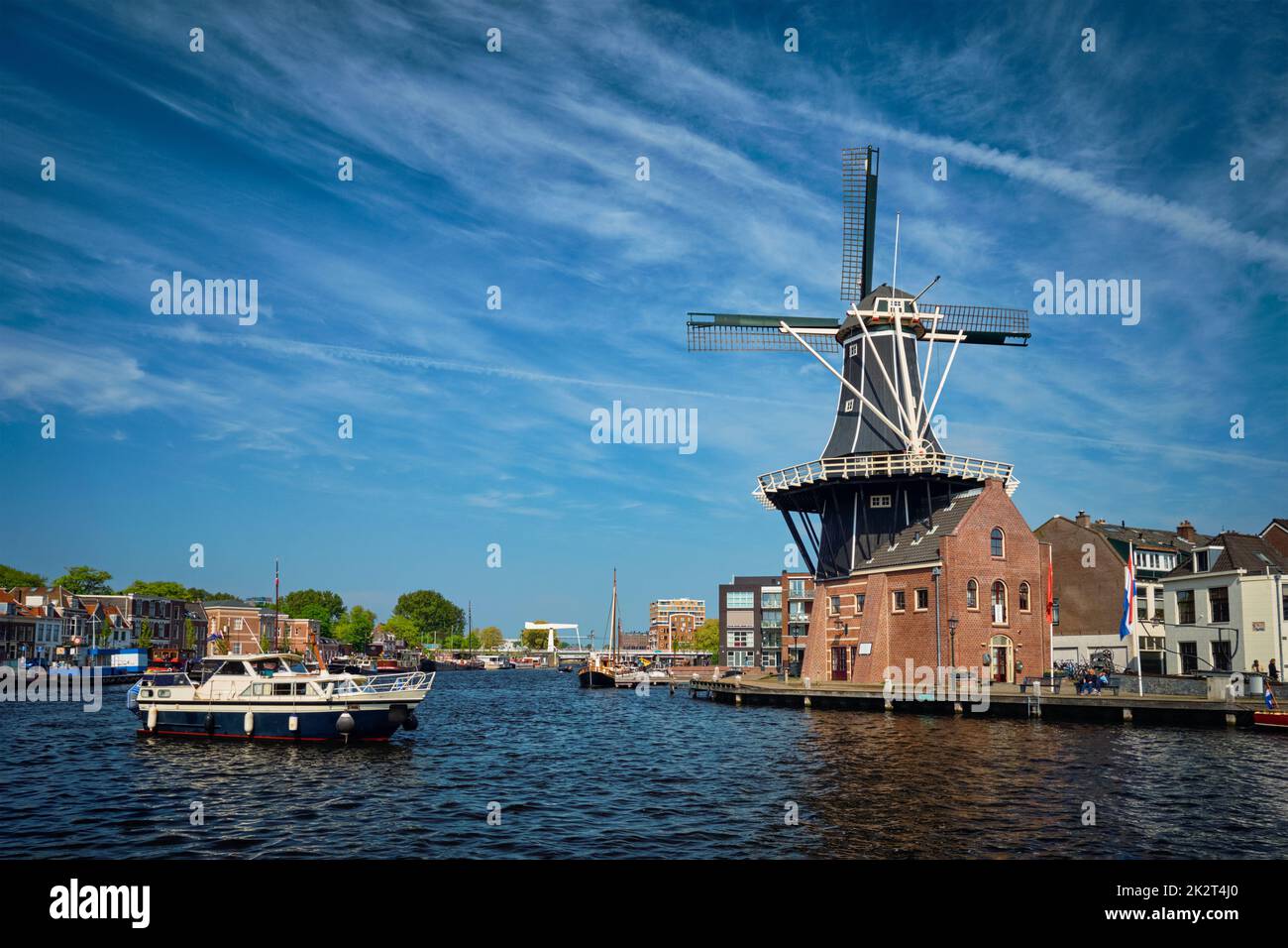 Harlem landmark windmill De Adriaan on Spaarne river. Harlem Stock Photo