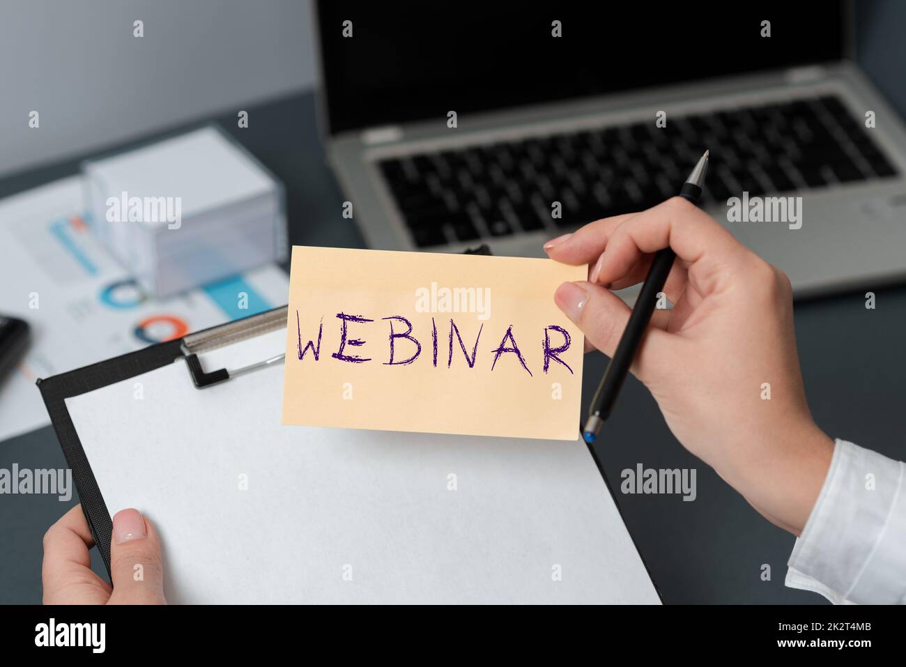 Hand writing sign Webinar. Internet Concept defined as seminar ...