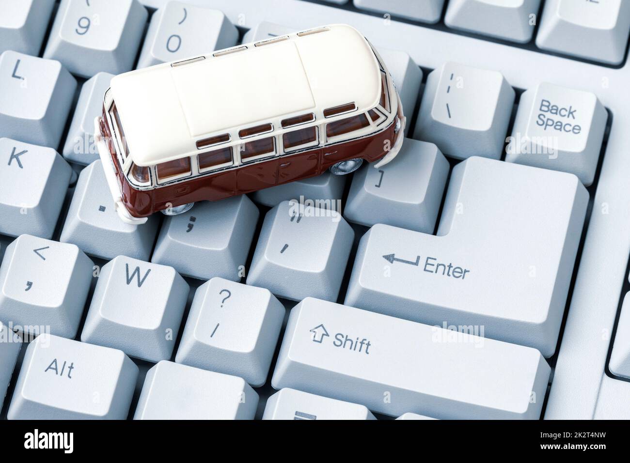 Small car on the keyboard Stock Photo