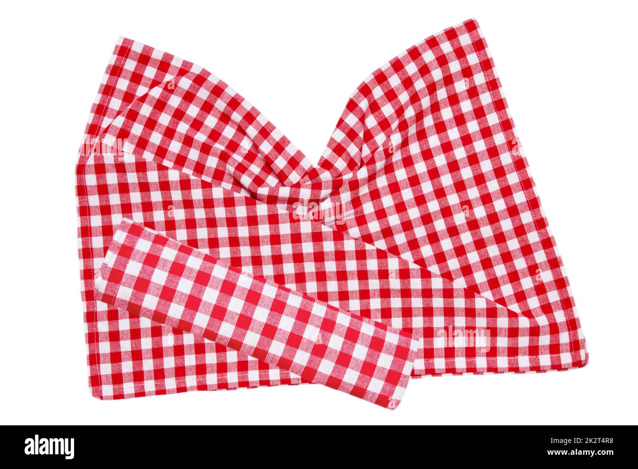 Red picnic blanket. Closeup of a red checkered napkin or tablecloth texture isolated on a white background. Beautiful backdrop for your product placement or montage. Stock Photo