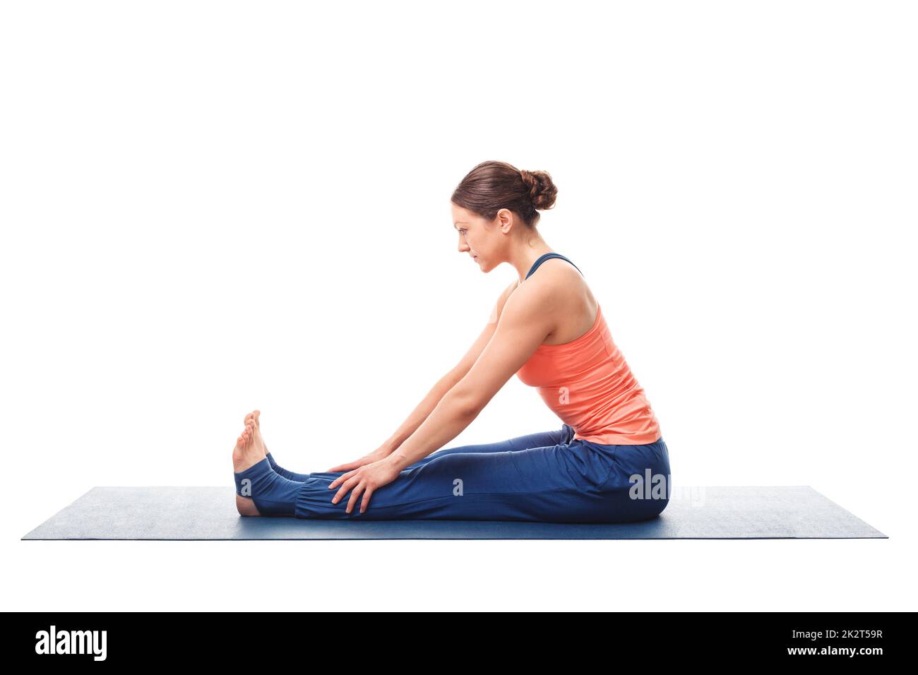 Sporty woman doing Ashtanga Vinyasa yoga asana Stock Photo