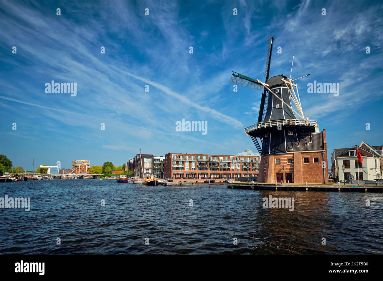 Harlem landmark windmill De Adriaan on Spaarne river. Harlem Stock Photo