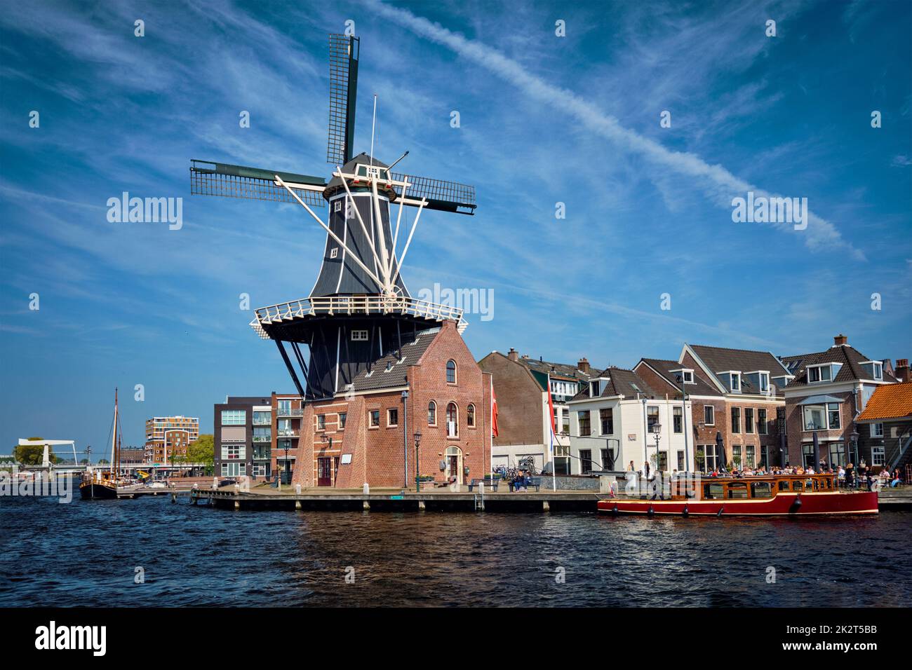 Harlem landmark windmill De Adriaan on Spaarne river. Harlem Stock Photo