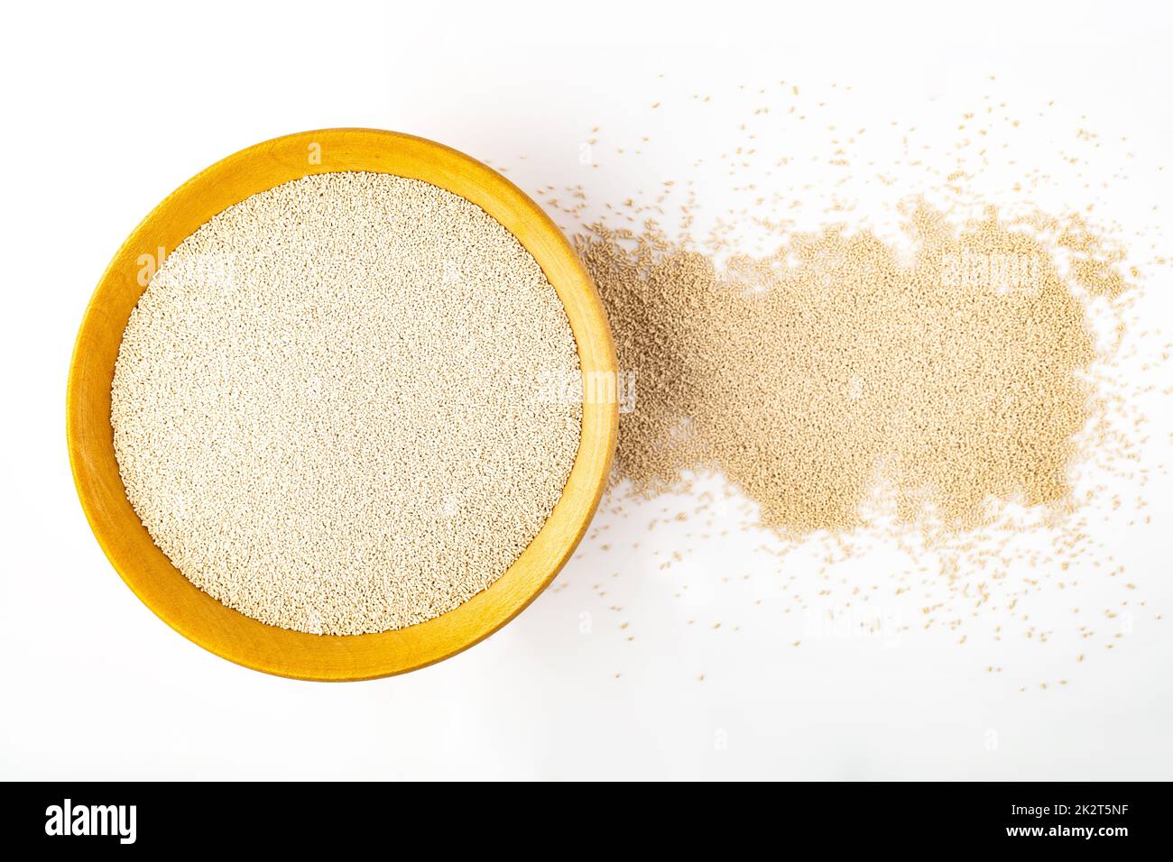Dry Yeast in a bowl over bright background Stock Photo