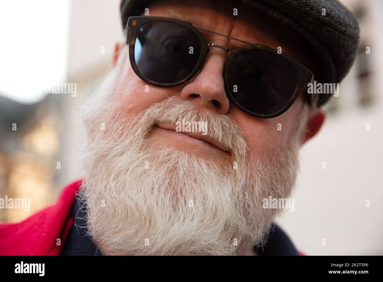 Headshot from friendly male man with big white beard Stock Photo