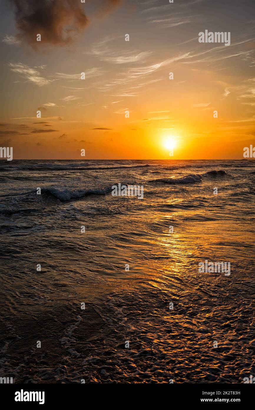 Ocean sunset with waves Stock Photo