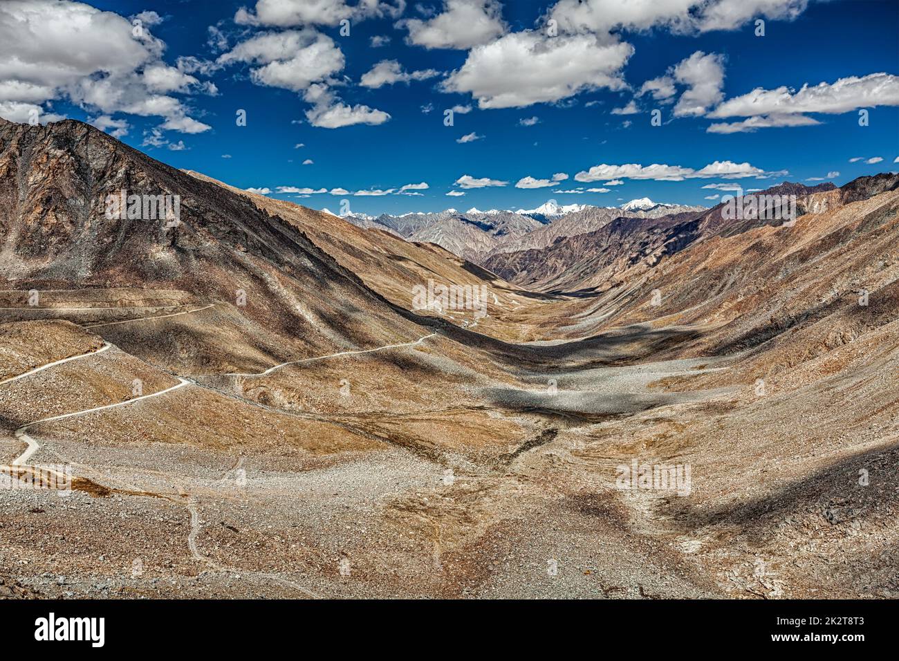 Karakoram Range and road in valley, Ladakh, India Stock Photo