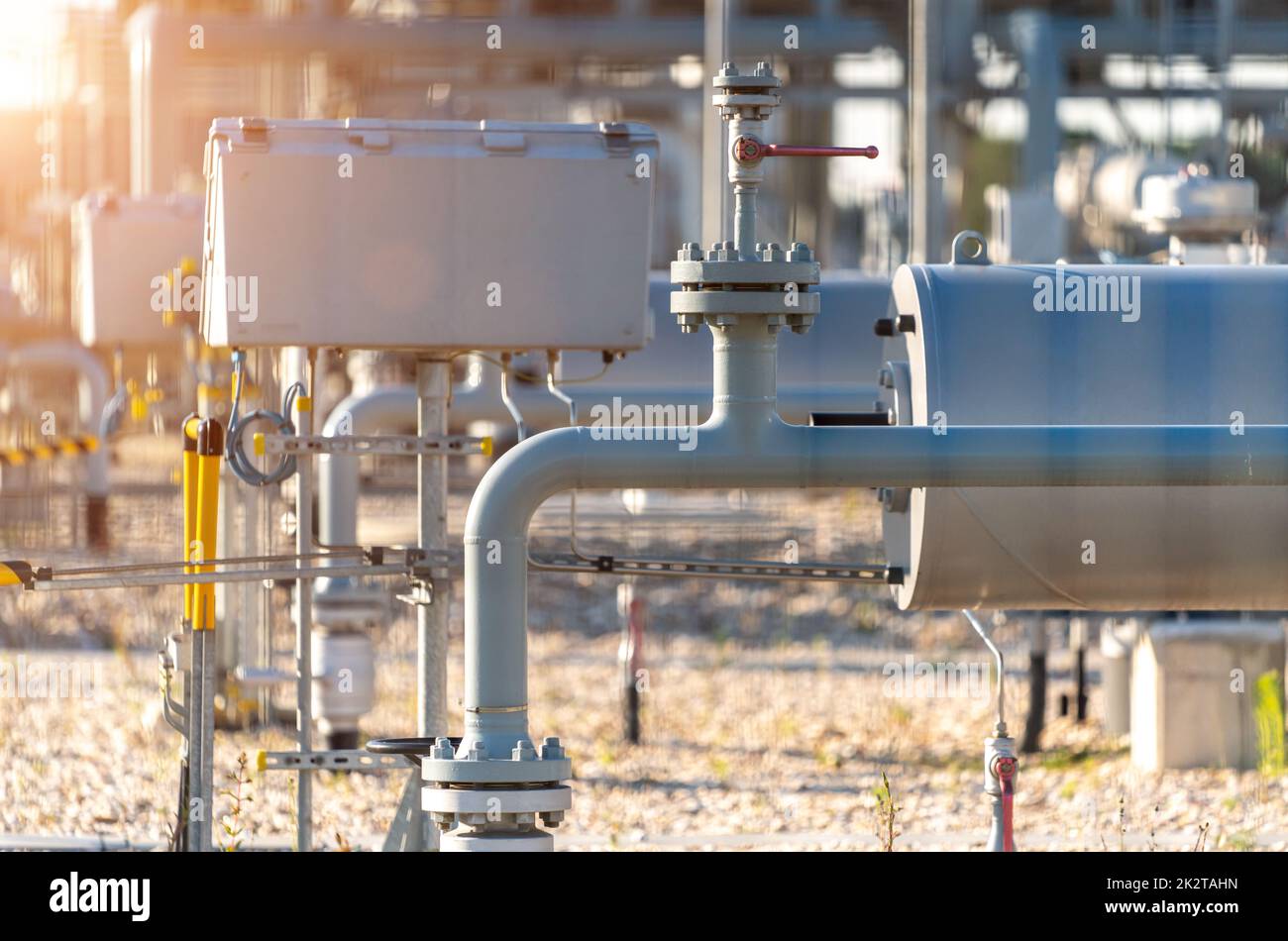 over land gas pipeline system at natural gas station Stock Photo