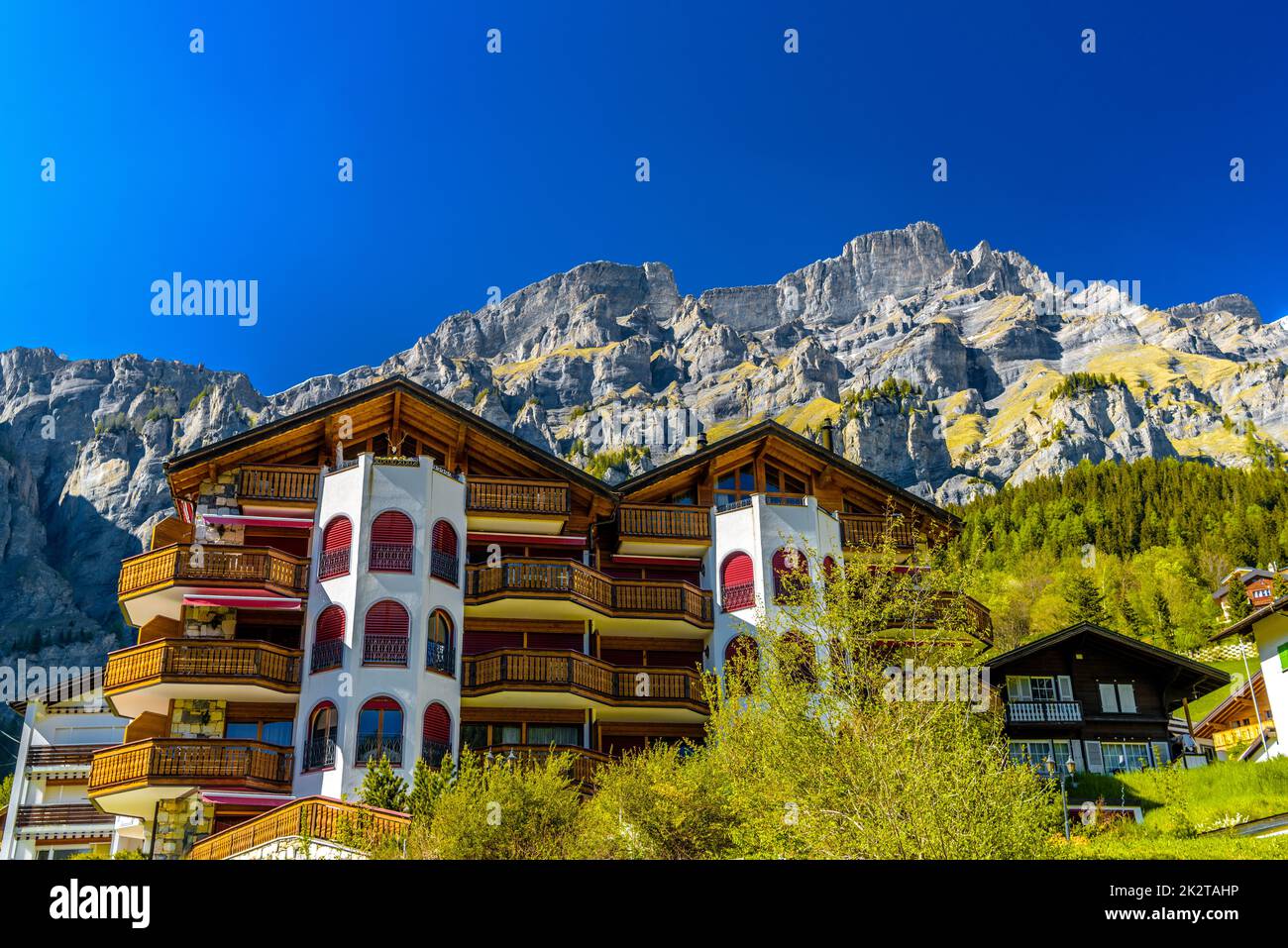 Chalet and hotels in swiss village in Alps, Leukerbad, Leuk, Vis Stock