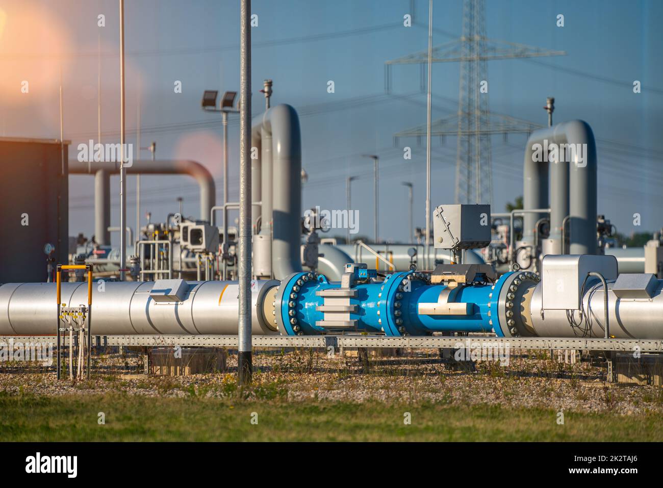 over land gas pipeline system at natural gas station Stock Photo Alamy