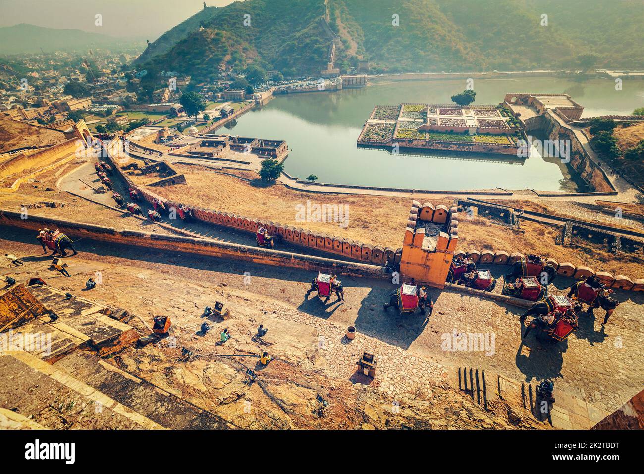 Tourists riding elephants on ascend to Amer fort Stock Photo