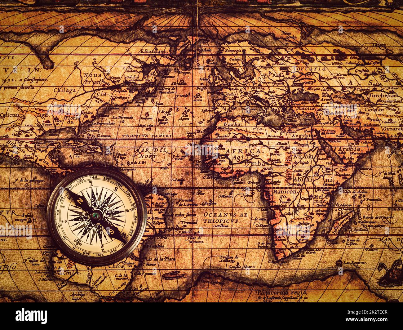 Compass and Chess on old map Stock Photo by ©kwanchaidp