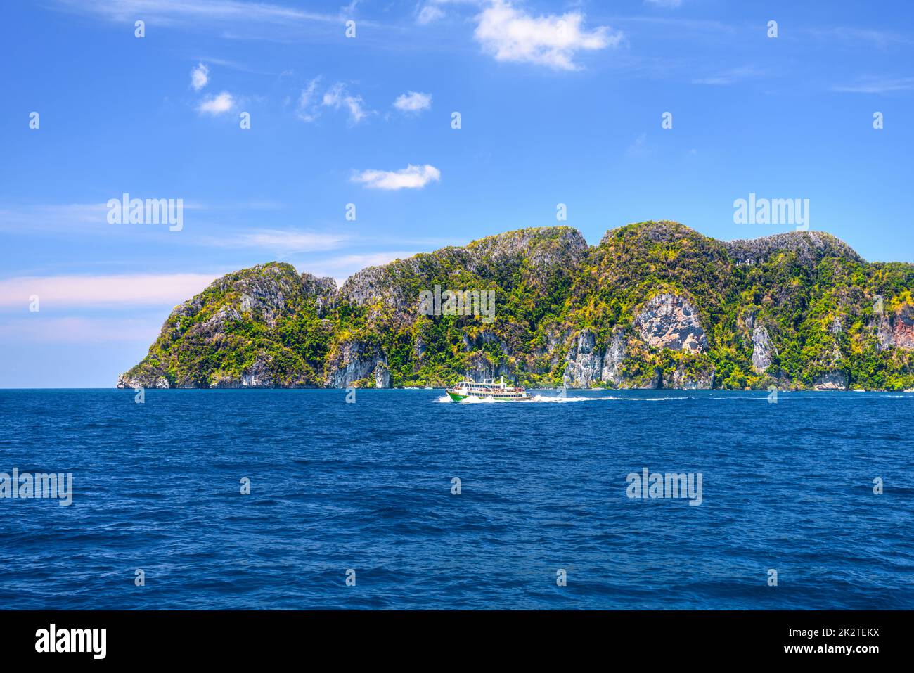 Ferries and rocks, Phi Phi Don island, Andaman sea, Krabi, Thail Stock