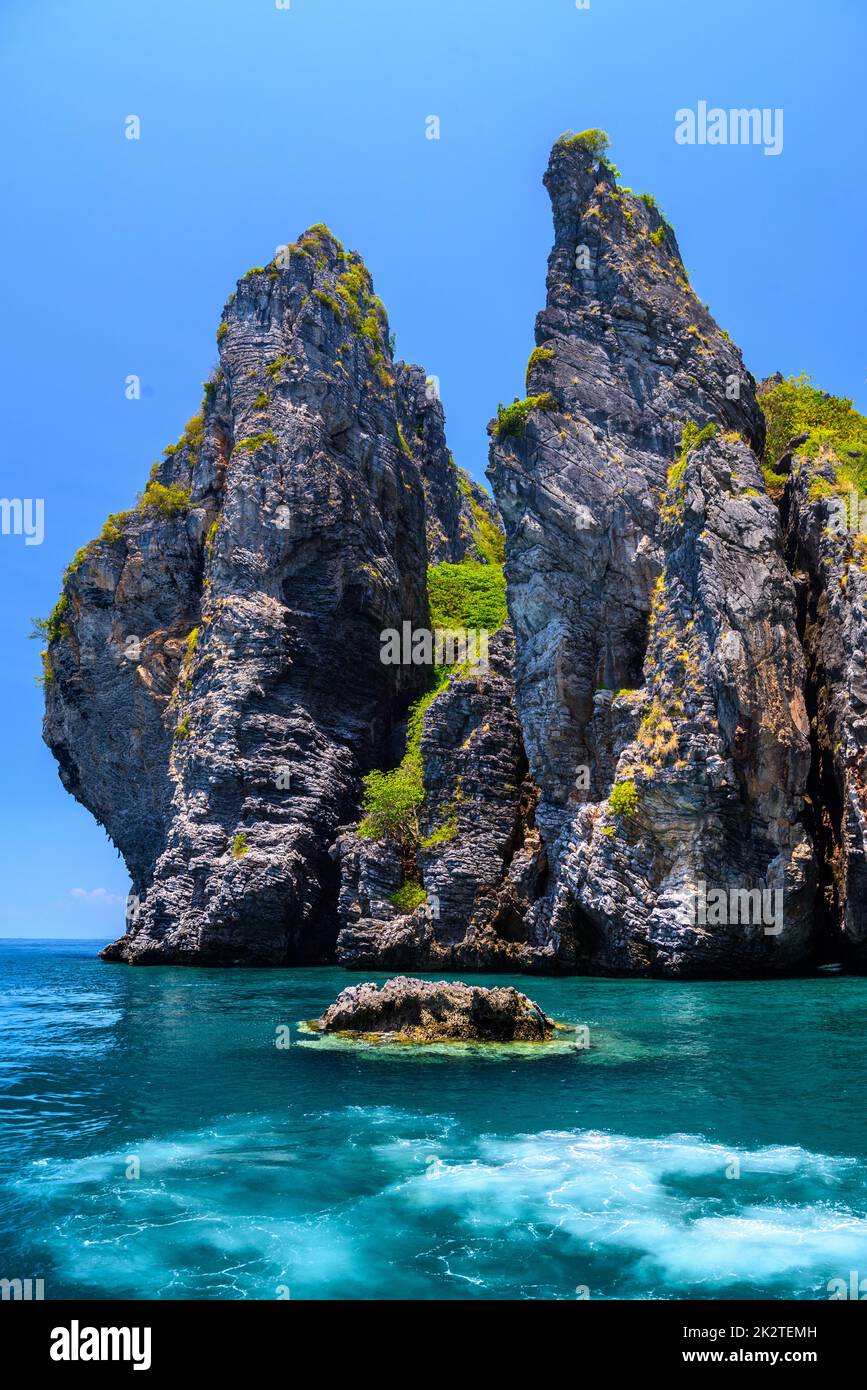 Rocks cliffs in the sea, Ko Yung island, Phi Phi, Andaman sea, K Stock Photo