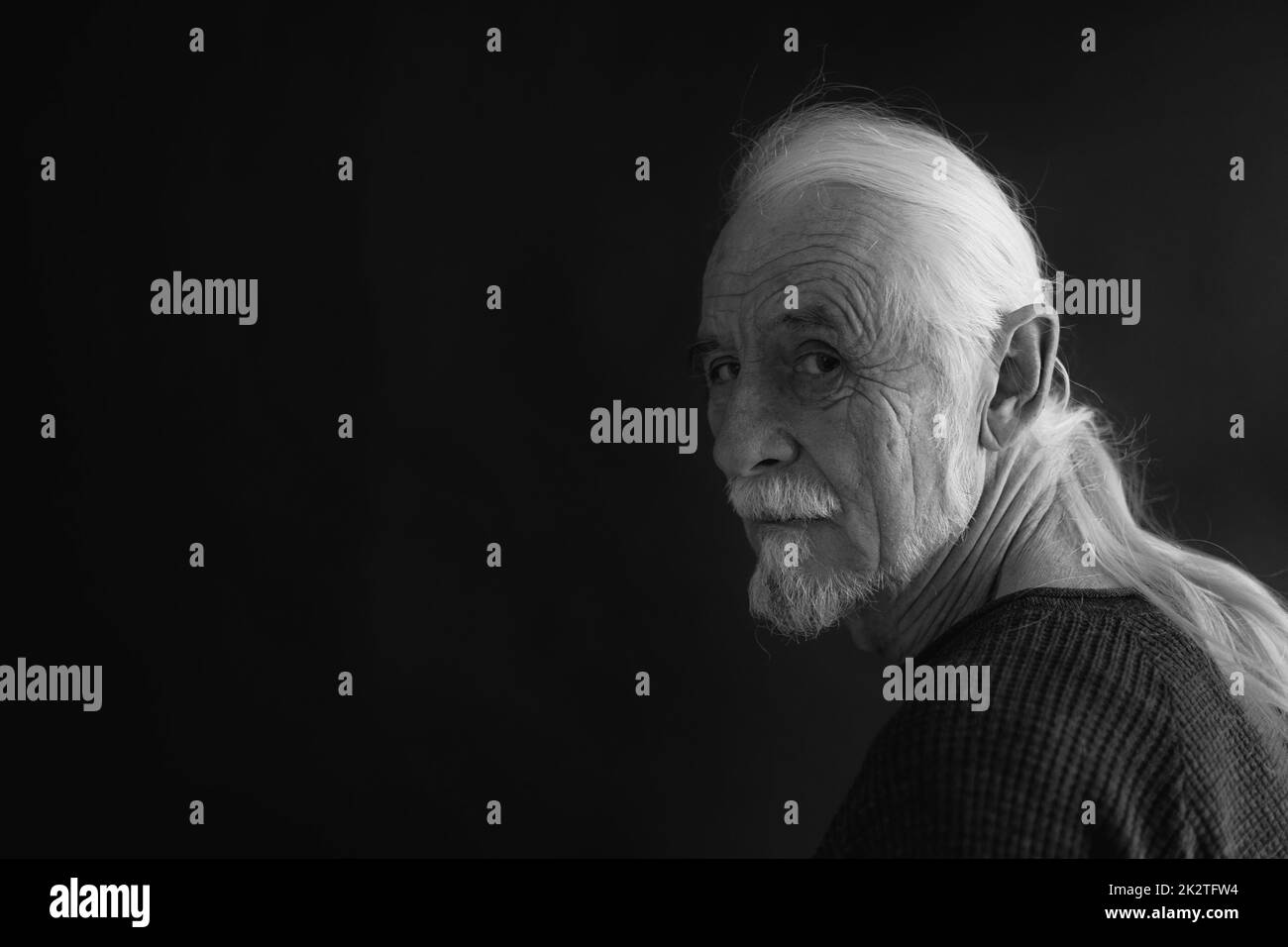 Black and white portrait of old alone man. Stock Photo