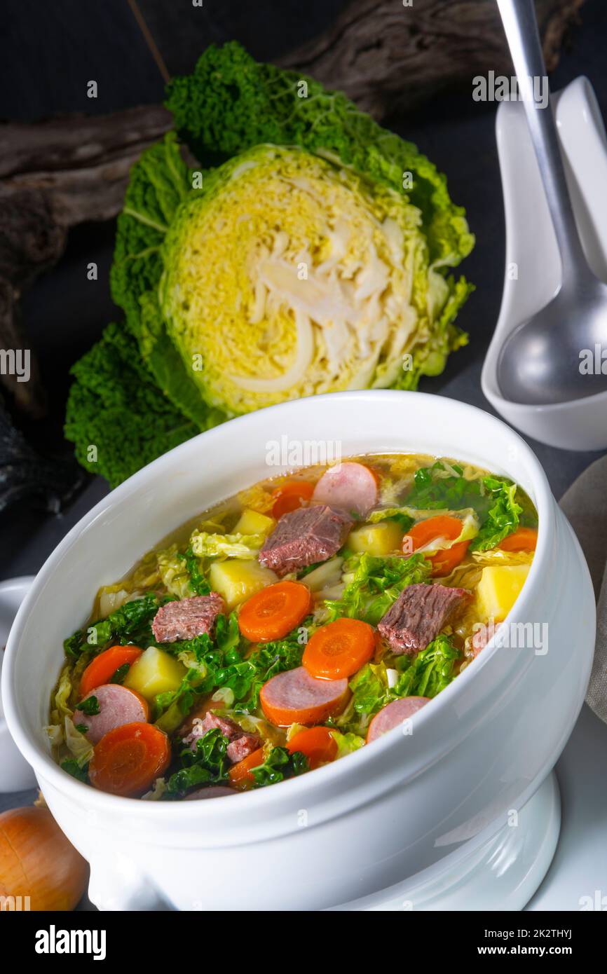 delicious savoy cabbage soup in white vase Stock Photo