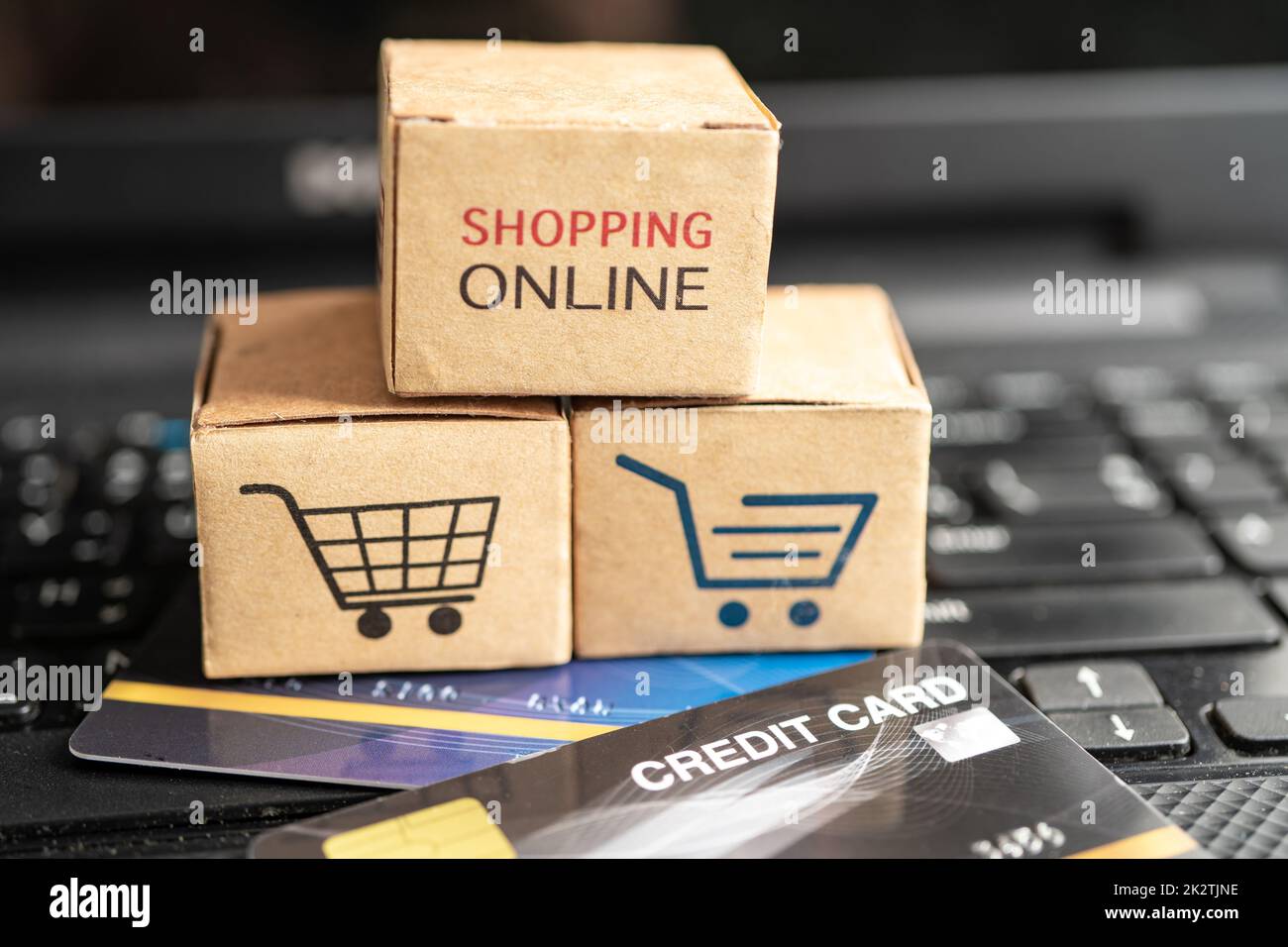 Shopping online box with credit card on laptop computer. Finance commerce import export business concept. Stock Photo