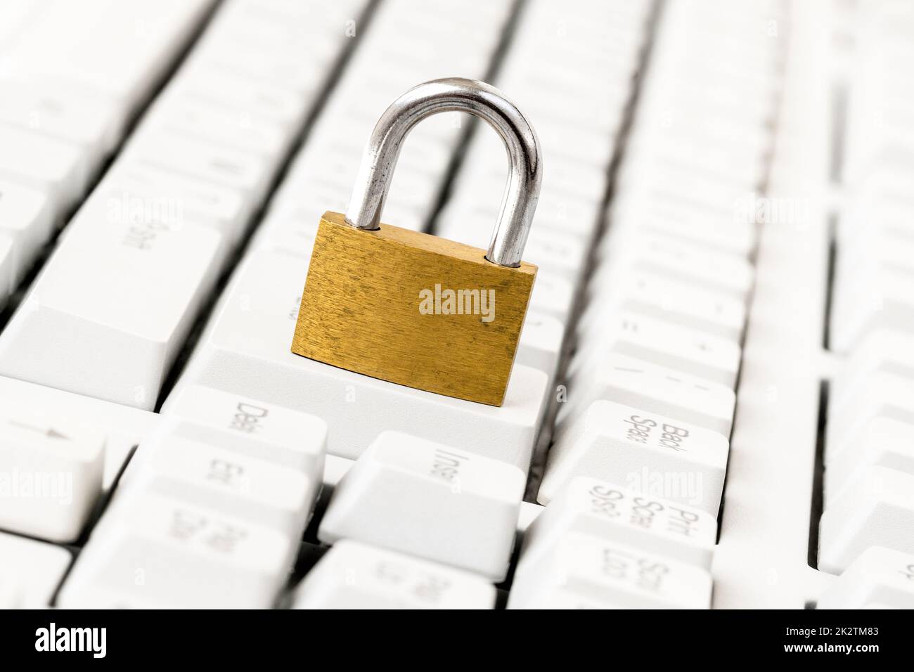 Security concept with metal padlock on computer keyboard Stock Photo