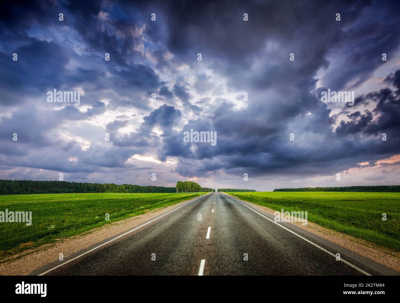 Road and stormy sky Stock Photo