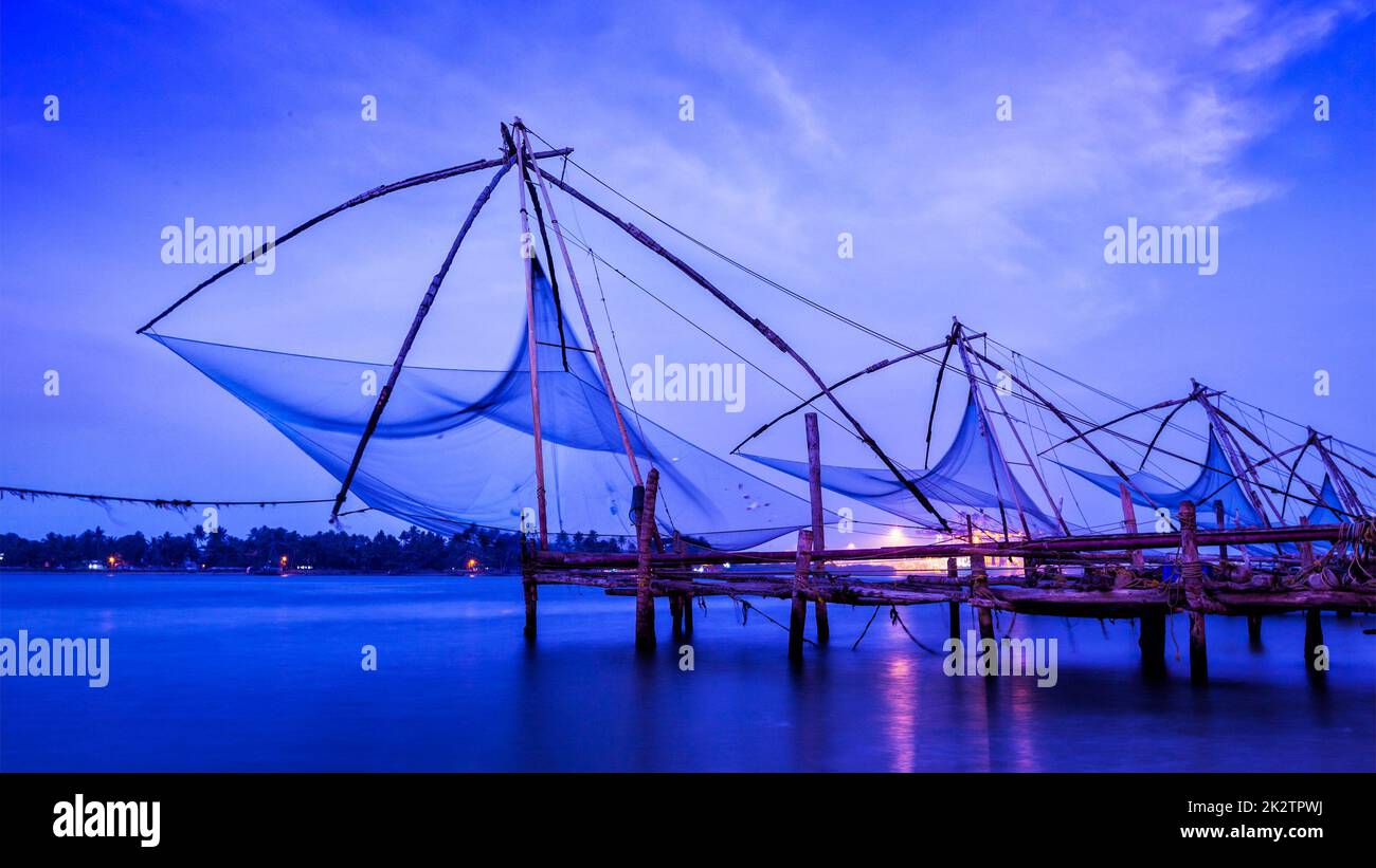 Chinese fishnets on sunset. Kochi, Kerala, India Stock Photo