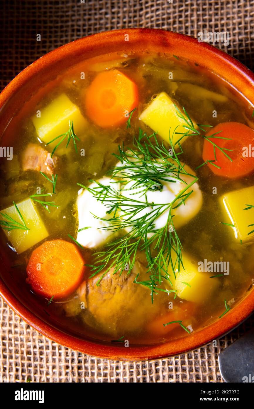 Polish sour cucumber soup with dill Stock Photo