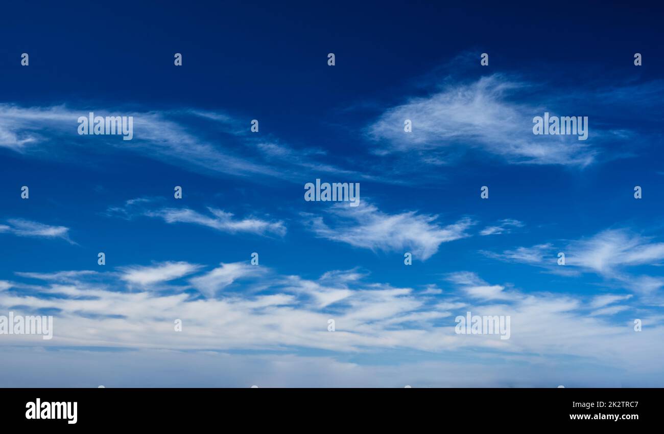 Blue clear sky with clouds Stock Photo
