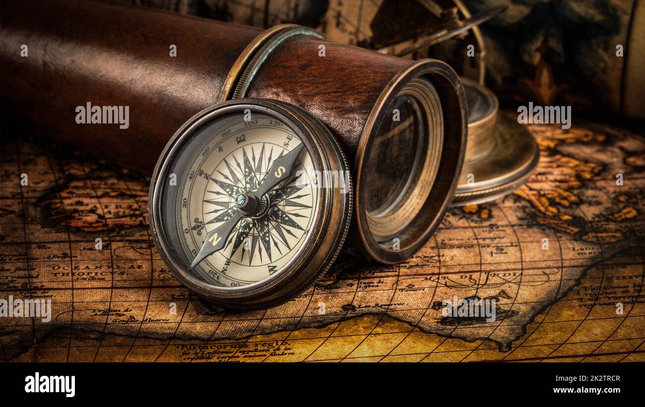 Old vintage compass on ancient map Stock Photo