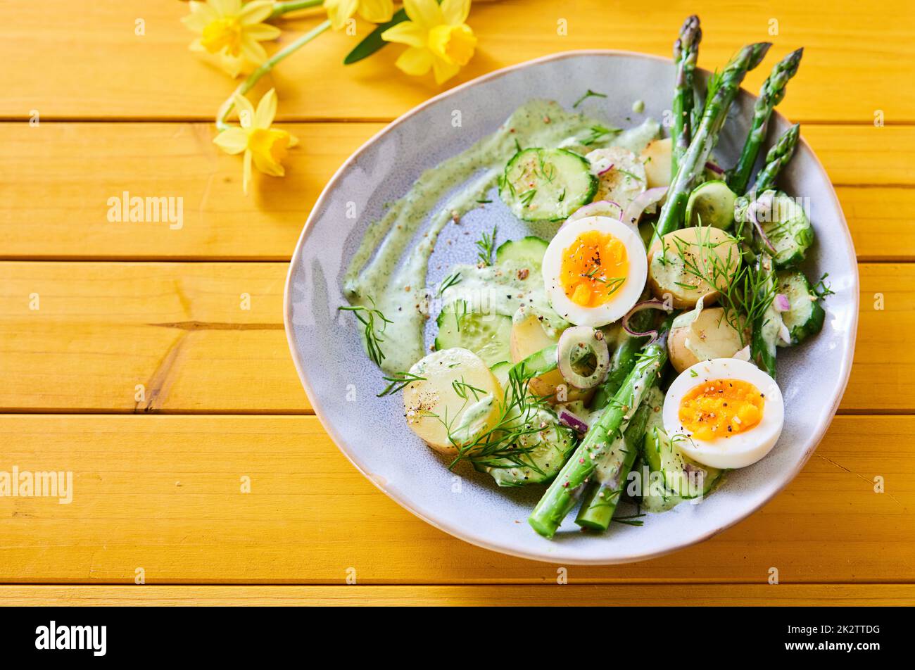 Palatable asparagus salad with eggs and potatoes Stock Photo