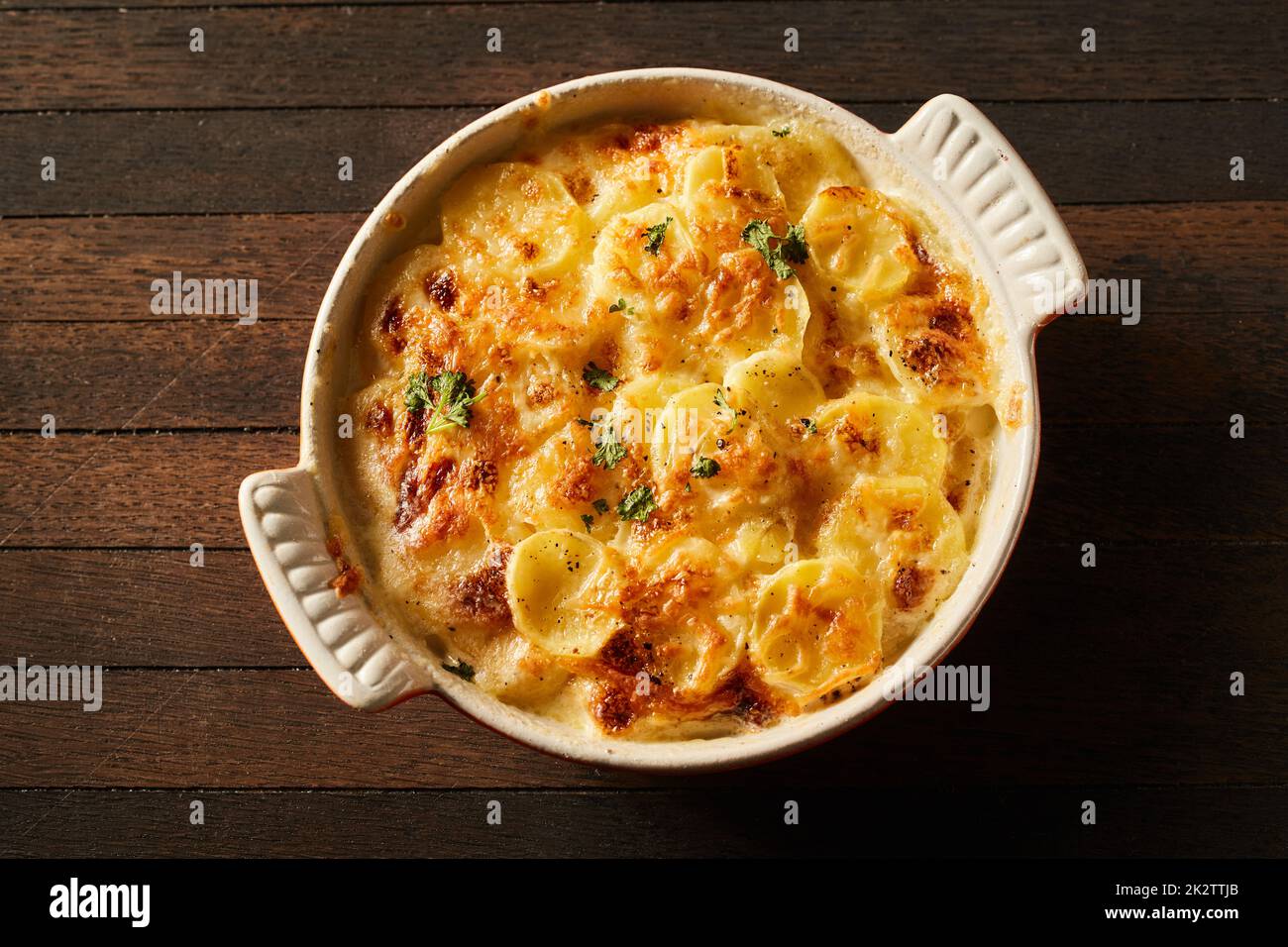 Homemade gratin baked potato in baking dish Stock Photo Alamy